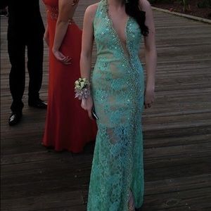 Teal and nude jeweled prom or pageant dress.